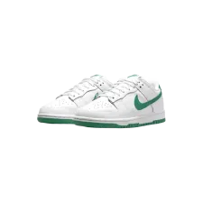 A pair of white Nike shoes with green swoosh and sole