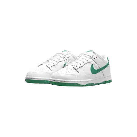 A pair of white Nike shoes with green swoosh and sole